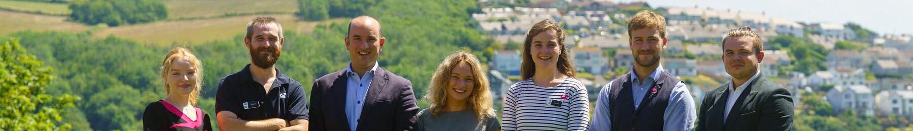 Smiling group on hillside